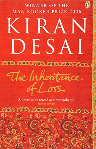 "The Inheritance of Loss" book cover with red background and ornate border design.