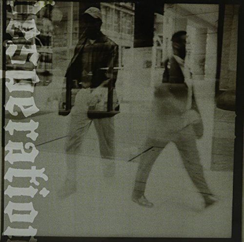 Black and white vinyl record cover with blurred figures walking.