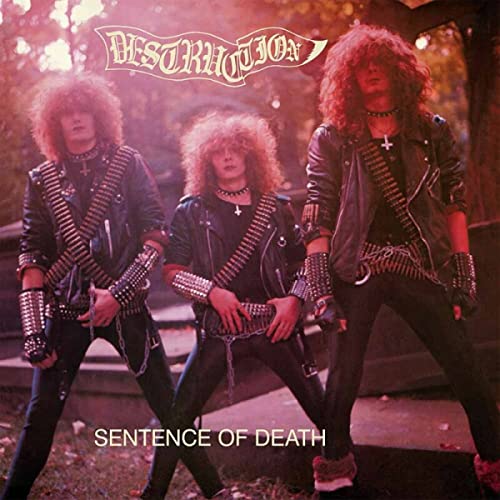 Album cover for Destruction’s “Sentence of Death” featuring three metal musicians.