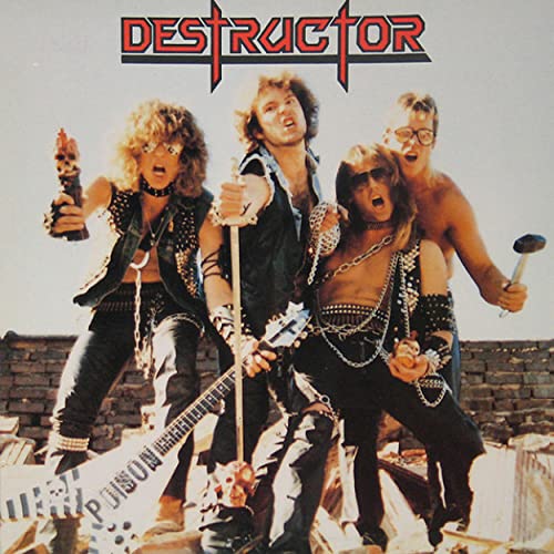 Heavy metal band Destructor poses with instruments and aggressive expressions.