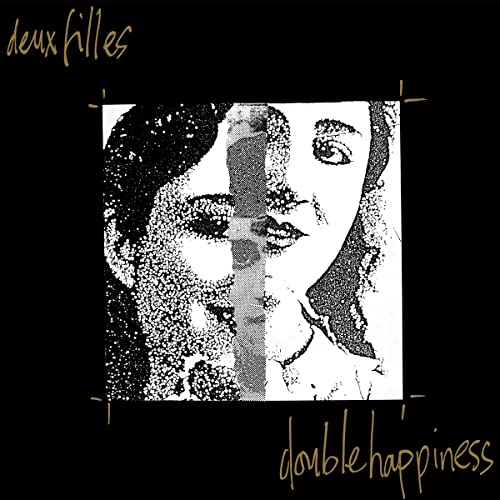 Black and white vinyl record cover featuring a split, mirrored portrait.