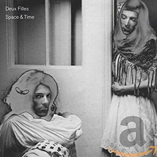 Black and white CD cover featuring two distorted faces in doorways.