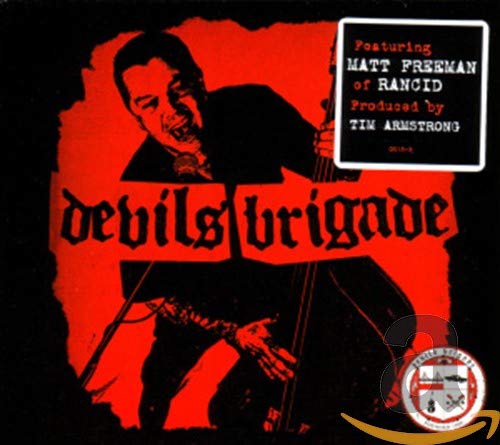 CD cover for Devil’s Brigade featuring a man with a bass, red background.
