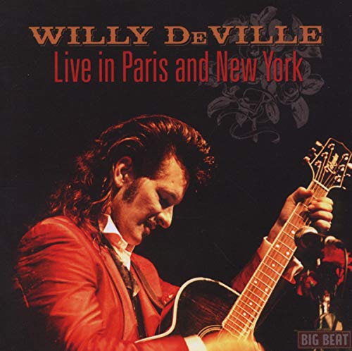 Willy DeVille album cover: musician playing acoustic guitar, dark background.