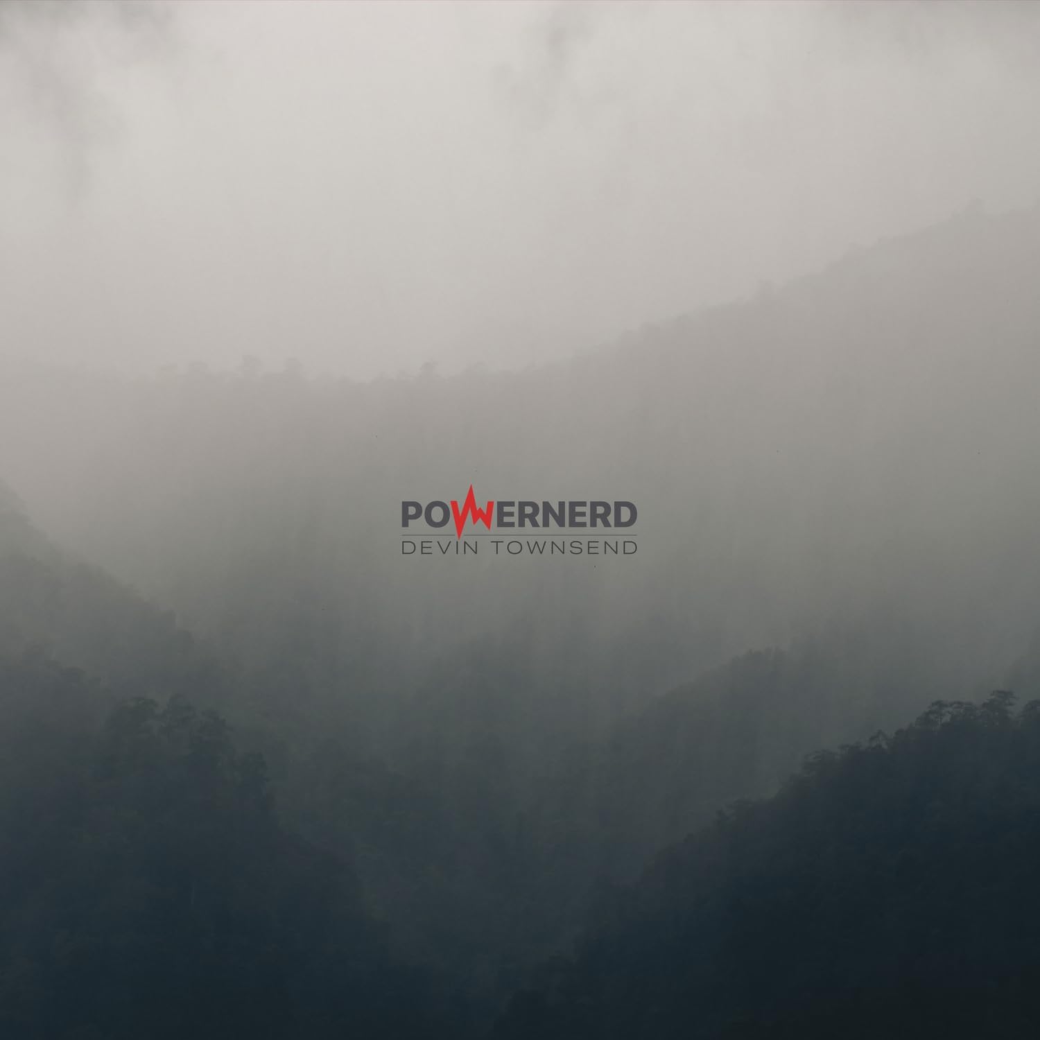 Devin Townsend’s “PowerNerd” album cover with misty mountain landscape.