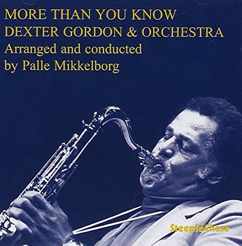 "Jazz album cover featuring Dexter Gordon playing saxophone with yellow text on dark blue background."