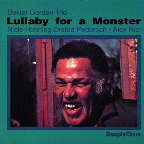 "CD cover with Dexter Gordon's portrait, green background, and bold black title text."