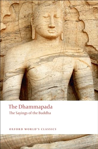 Book cover of “The Dhammapada” featuring a stone Buddha sculpture.