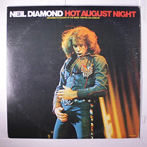 Neil Diamond album cover, "Hot August Night," featuring a portrait of the artist.