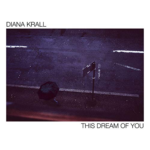 Diana Krall's album cover: dark road with umbrella and signpost, white borders with text.