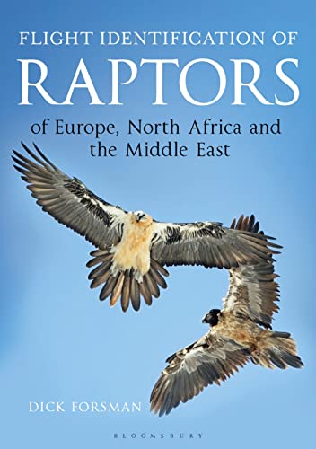 Handbook with raptor images, field guides, and text on bird identification and species.