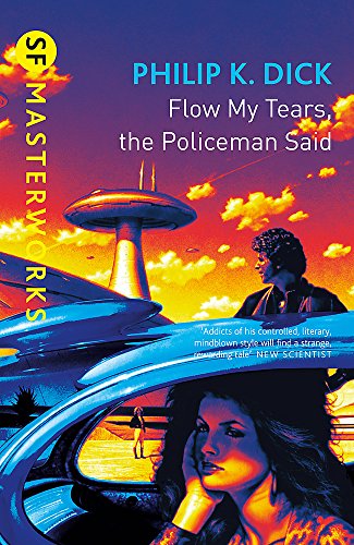 Book cover: futuristic cityscape, UFO, woman in car, Philip K. Dick title.