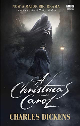 Book cover for “A Christmas Carol” featuring a man and ghostly figure.