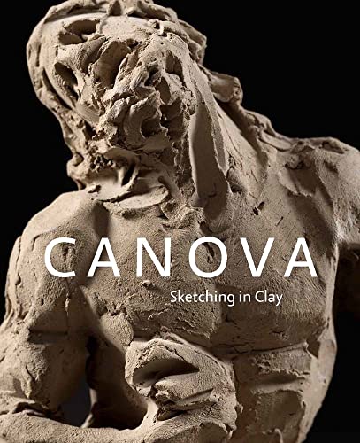 Clay sculpture of a male torso with book title "Canova.