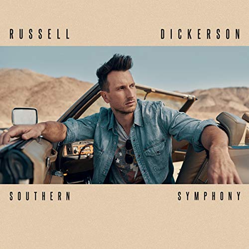 "Album cover with man in convertible, desert landscape, and beige background."