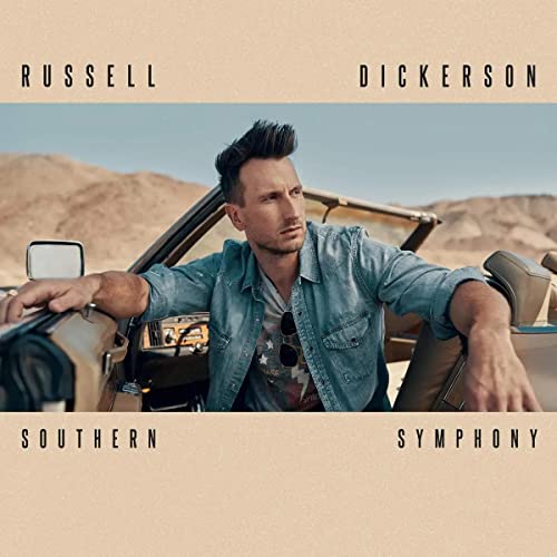 Russell Dickerson sits in a convertible in the desert on the album cover art.
