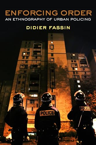 Book cover: police officers in riot gear facing a tall building.