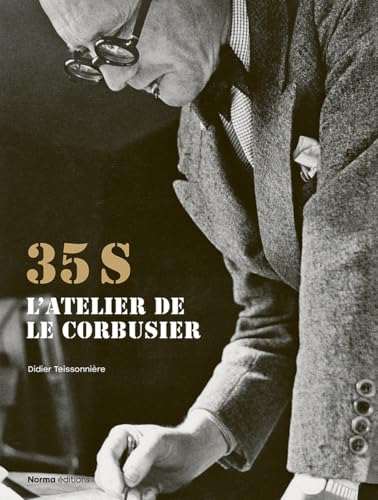 Book cover featuring Le Corbusier working at a desk, in black and white.
