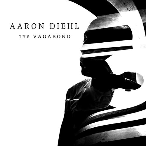 Album cover: silhouette of a man playing piano, with bold black and white design.
