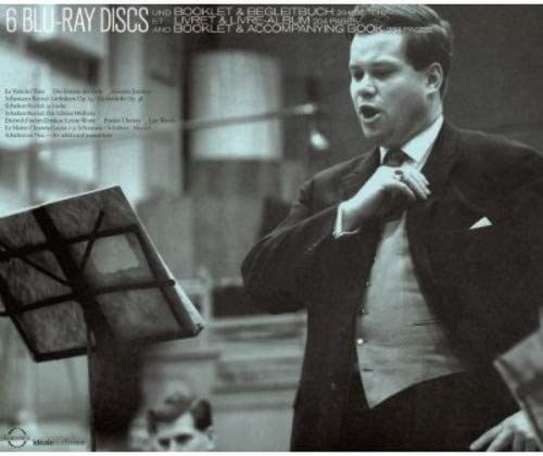 Black and white photo of Dietrich Fischer-Dieskau singing with sheet music.