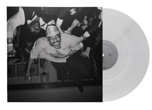 Dijon's "Baby" vinyl record with a black and white portrait cover.