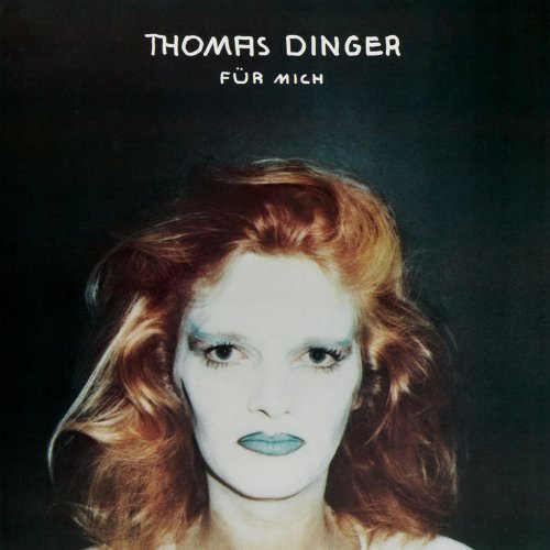 Album cover featuring a woman with red hair and blue lips against a dark background.