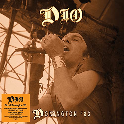Ronnie James Dio singing into a microphone at Donington '83 concert.
