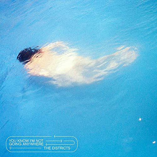 The image depicts a person submerged in water, with a blue background and white text.