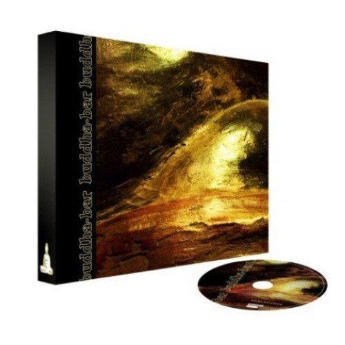 Black box set with abstract golden wave painting and accompanying CD.