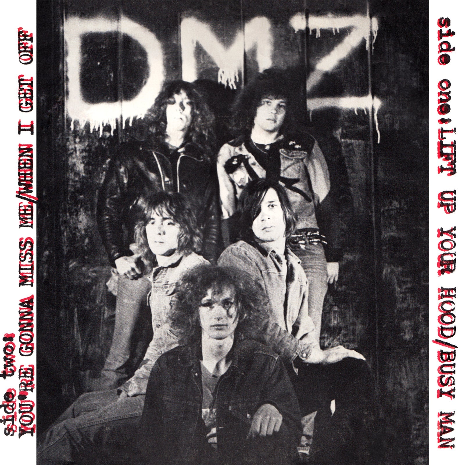Black and white vinyl record cover featuring a band portrait.