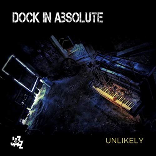 Dark album cover featuring broken keyboards and electronic components.