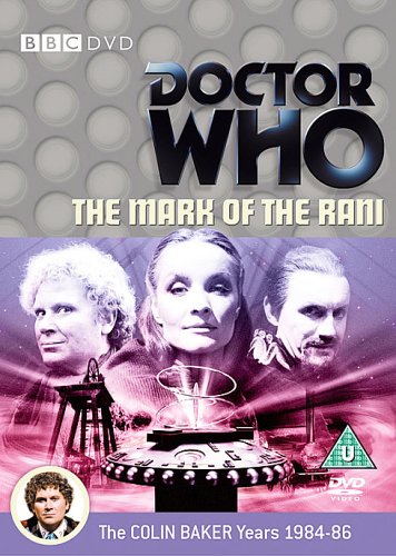 "Doctor Who DVD cover featuring three characters and a spaceship, with grey and purple background."