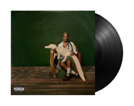 Doechii album cover featuring a woman with an alligator, vinyl record beside.