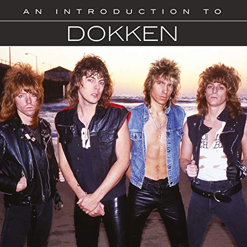 1980s rock band Dokken posing on a beach, album cover art.