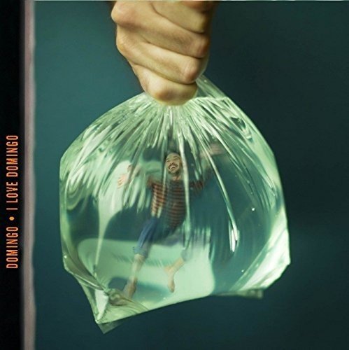 CD cover: man inside a plastic bag, distorted view.