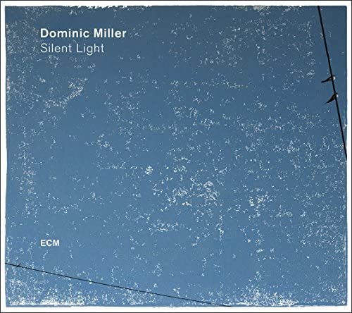 CD cover for Dominic Miller’s “Silent Light”, blue sky with birds.
