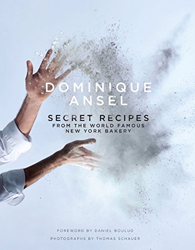 Cookbook cover with hands dusting flour, titled “Dominique Ansel: Secret Recipes.”
