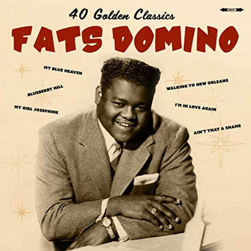 Fats Domino album cover featuring a portrait of the musician in a suit.