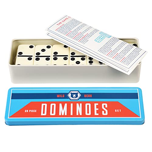 Dominoes set in a tin with instructions, featuring black dots on white tiles.