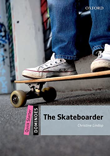 A person in blue jeans and white sneakers riding a skateboard on pavement.