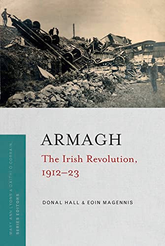 Book cover: historical photo of derailed train, text “Armagh: The Irish Revolution.”