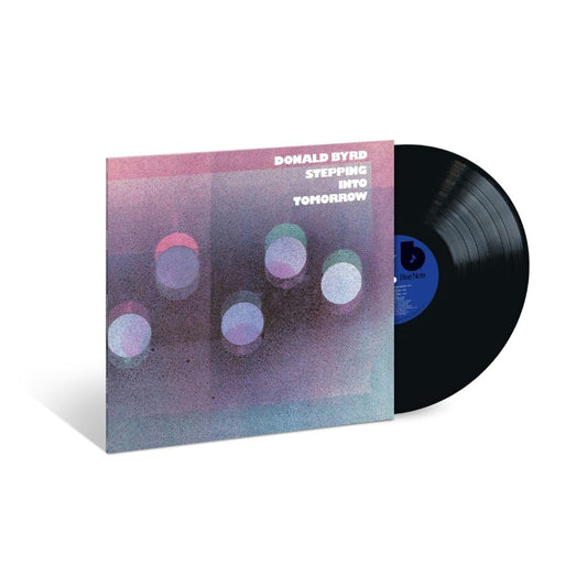 Donald Byrd’s “Stepping Into Tomorrow” vinyl record with abstract cover art.