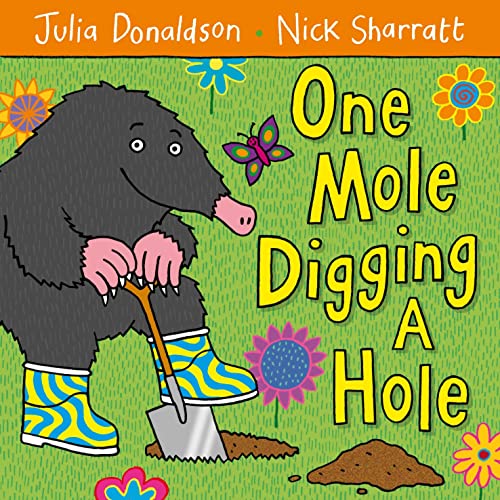 Illustration of a gray mole wearing blue boots, digging with a shovel.