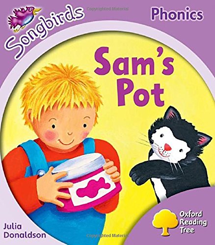 Book cover featuring a boy holding a pot and a black and white cat.