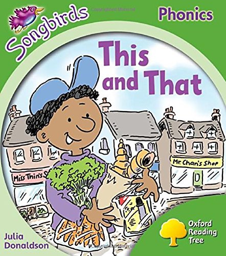 Book cover: child with bird, village scene, "This and That" title.