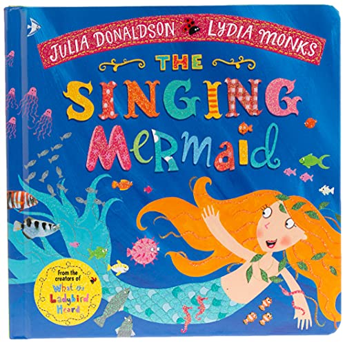 Book cover: "The Singing Mermaid" featuring a mermaid and colorful fish.