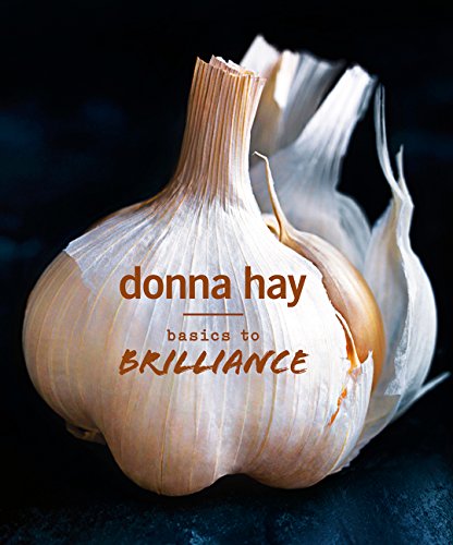 Cookbook cover featuring a bulb of garlic and title "Basics to Brilliance".