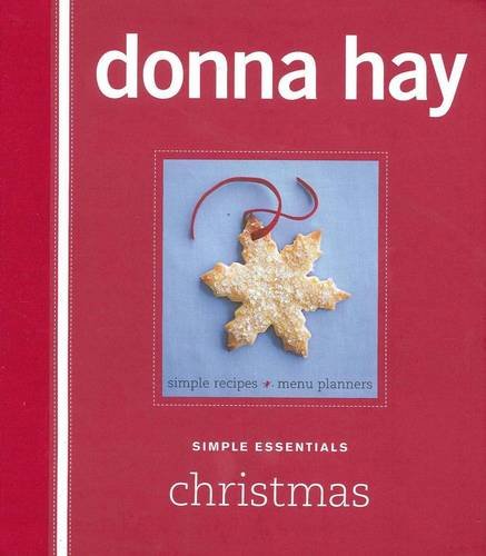 Red cookbook cover with snowflake image and “Simple Essentials Christmas” text.