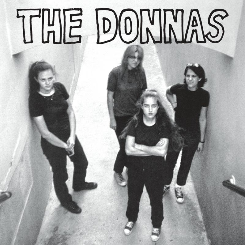 Black and white photo of four women, The Donnas band members.
