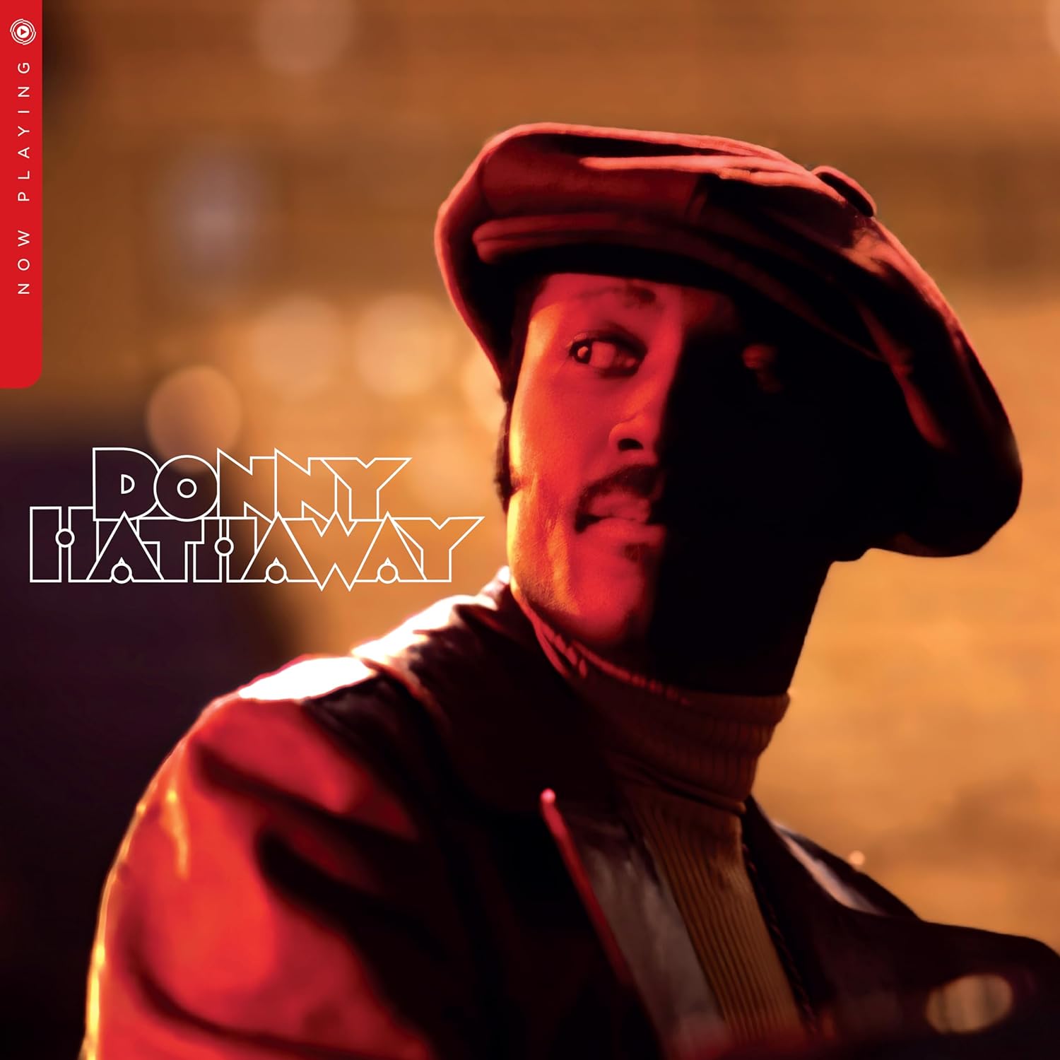 Donny Hathaway portrait in a beret, album cover with white text.